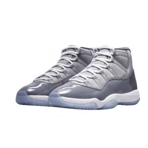 Jordan 11 Retro Cool Grey 2021 (GS), Air Jordan 11 Cool Grey, grade school basketball sneakers, grey and white Jordans, stylish high tops, Nike Air Jordan, classic design, limited edition Jordans, kids' sneaker collection, urban fashion sneakers, Cool Grey colorway, retro sneaker design, Jordan brand shoes, premium materials, iconic Jordans, comfortable fit, streetwear style, collector's edition Jordans, shiny patent leather, durable kids' footwear.