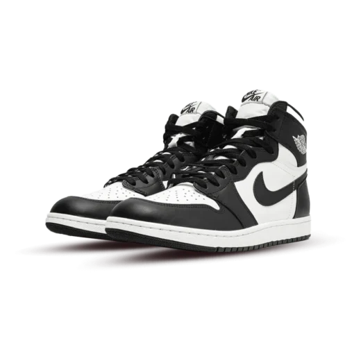 Jordan 1 Retro High 85 Black White (2023), Air Jordan 1 85 Black White, retro high sneakers, black and white Jordans, stylish high tops, Nike Air Jordan, classic basketball shoes, Jordan 1 OG, limited edition Jordans, sneaker collection, urban fashion sneakers, vintage-inspired design, retro sneaker aesthetic, Jordan brand shoes, premium materials, iconic Jordans, comfortable high tops, streetwear style, collector's edition Jordans, timeless colorway.