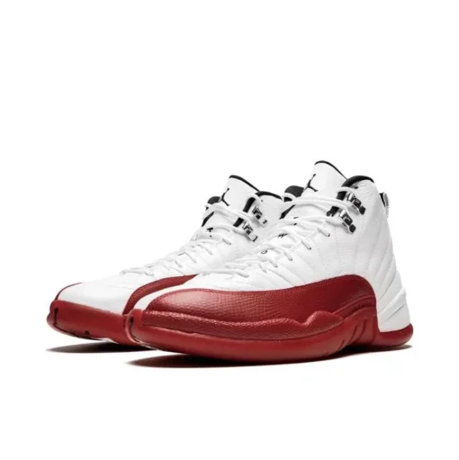 Jordan 12 Retro Cherry (2023) (GS), Air Jordan 12 Cherry, grade school basketball sneakers, white and red Jordans, stylish high tops, Nike Air Jordan, classic design, limited edition Jordans, kids' sneaker collection, urban fashion sneakers, cherry colorway, retro sneaker design, Jordan brand shoes, premium materials, iconic Jordans, comfortable fit, streetwear style, collector's edition Jordans, durable kids' footwear, vibrant sneakers.