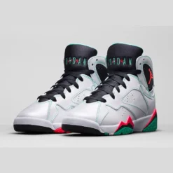 Jordan 7 Retro Verde (GS), Air Jordan 7 Verde, grade school sneakers, white, green, and infrared Jordans, stylish high tops, Nike Air Jordan, classic design, limited edition Jordans, kids' sneaker collection, urban fashion sneakers, Verde colorway, retro sneaker design, Jordan brand shoes, premium materials, iconic Jordans, comfortable fit, streetwear style, collector's edition Jordans, vibrant accents, performance footwear.